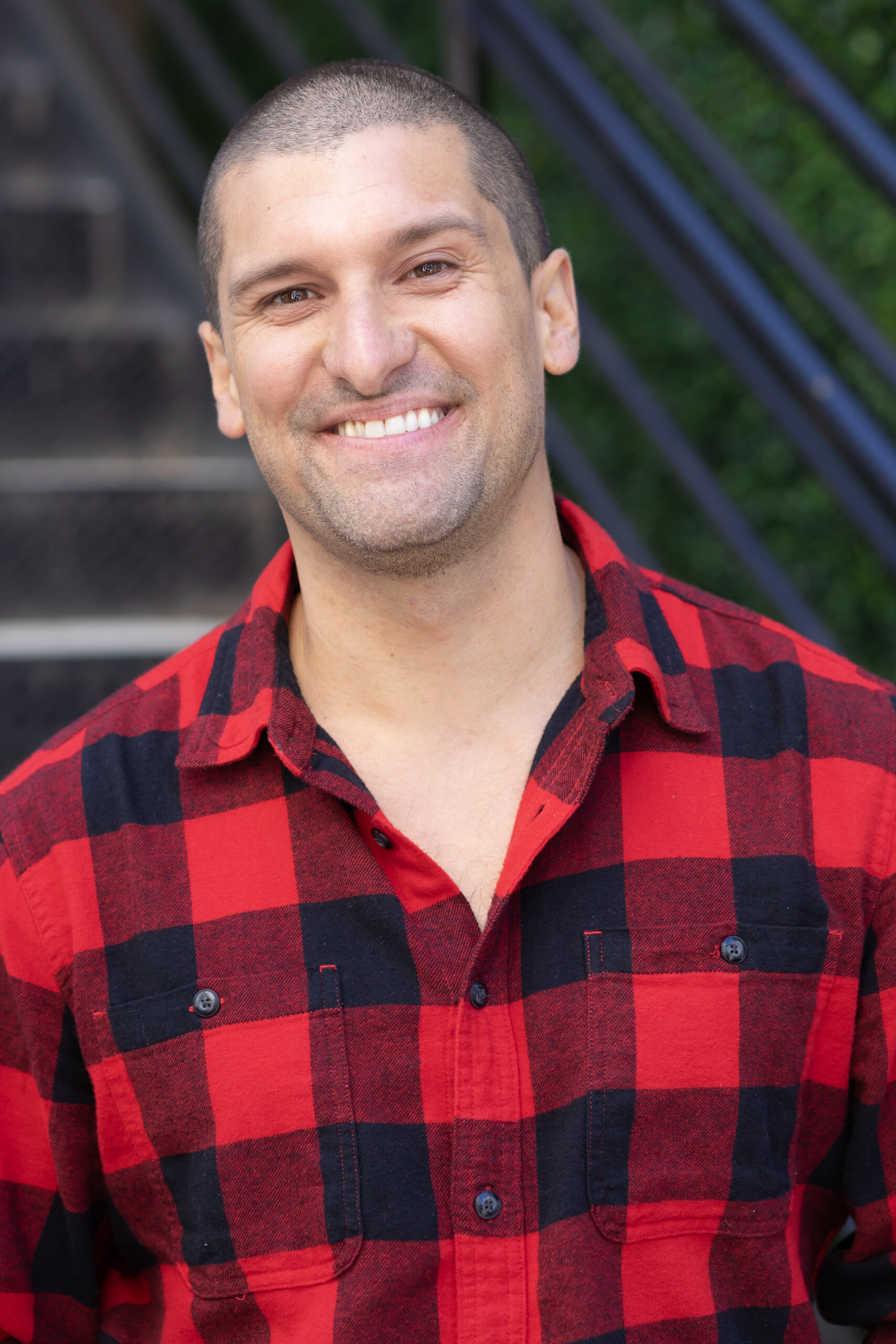 IMG_2346edit (1) Image of Drew Webster in a red plaid shirt